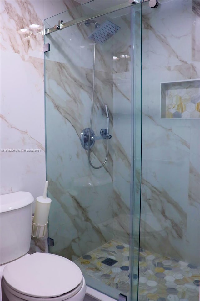 900 Saint Charles Pl Unit 316, Pembroke Pines, FL 33026 - full bathroom with a marble finish shower