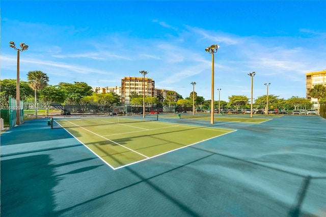 900 Saint Charles Pl Unit 316, Pembroke Pines, FL 33026 - view of tennis court with community basketball court