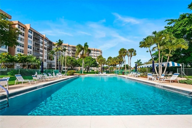 900 Saint Charles Pl Unit 316, Pembroke Pines, FL 33026 - community pool with a patio area