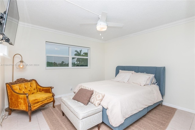 bedroom with ceiling fan, light tile patterned floors, and crown molding