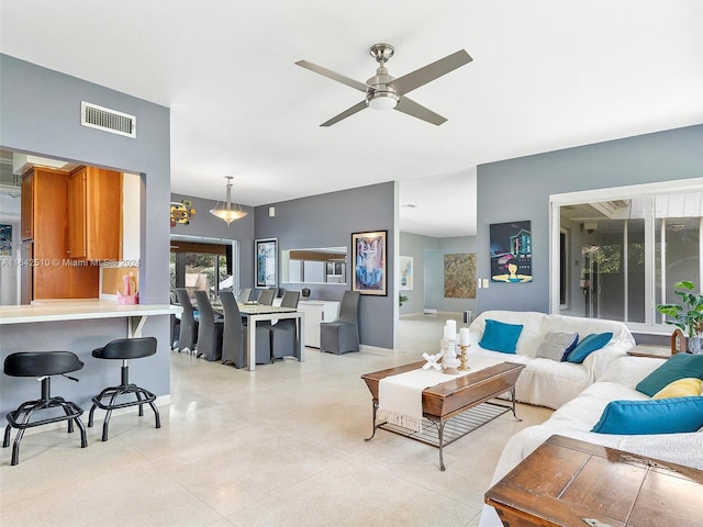 living room featuring ceiling fan