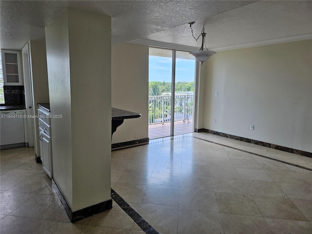 1650 Coral Way Unit 601, Miami, FL 33145 - spare room with a textured ceiling, inlaid floor details, floor to ceiling windows, and ornamental molding