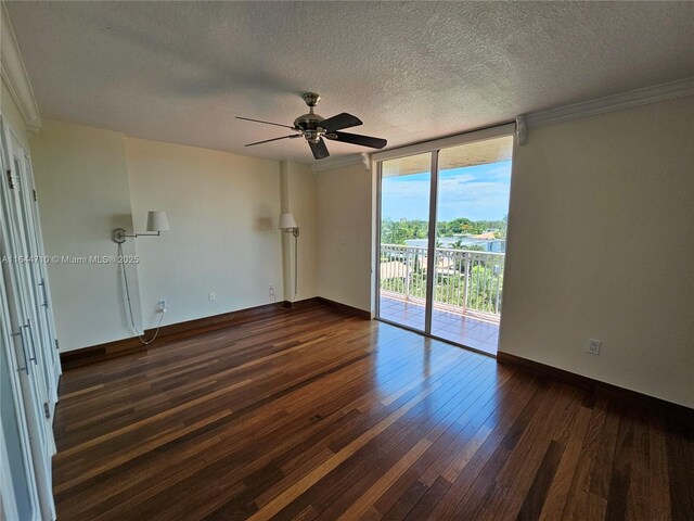1650 Coral Way Unit 601, Miami, FL 33145 - unfurnished room featuring ceiling fan, expansive windows, dark wood-type flooring, a textured ceiling, and crown molding