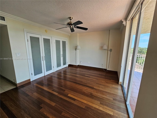 1650 Coral Way Unit 601, Miami, FL 33145 - empty room featuring french doors, hardwood / wood-style flooring, a ceiling fan, a textured ceiling, and crown molding
