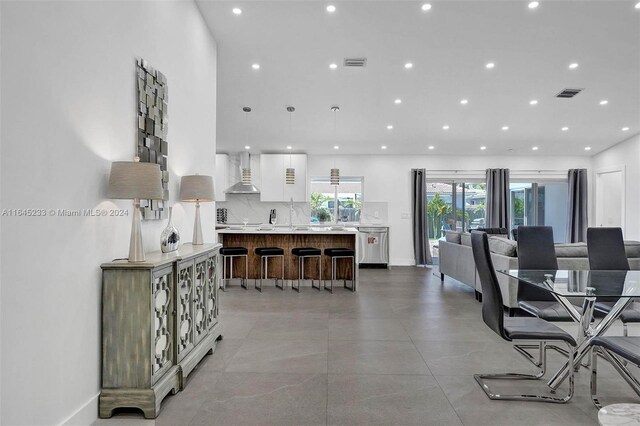 living room with light tile patterned floors