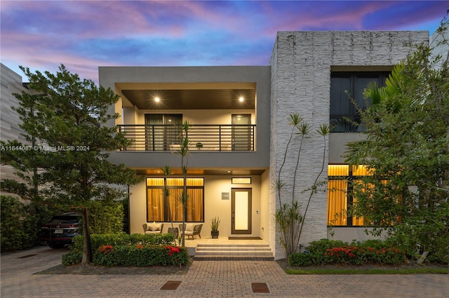 modern home featuring a balcony