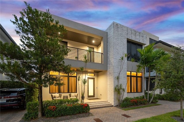 modern home with a balcony