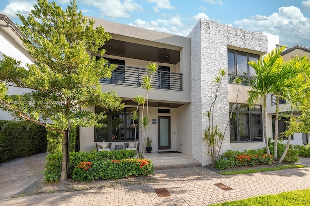 modern home with a balcony