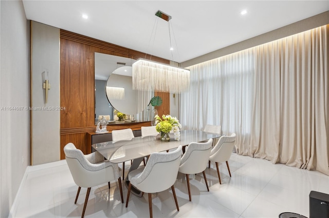 dining area with light tile patterned floors