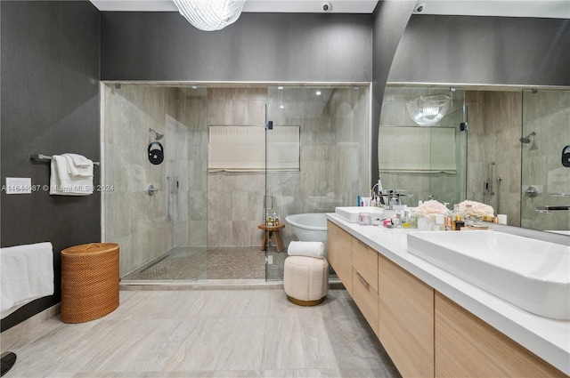 bathroom with toilet, double sink vanity, walk in shower, and tile patterned floors