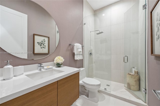 bathroom with toilet, vanity, walk in shower, and tile patterned floors