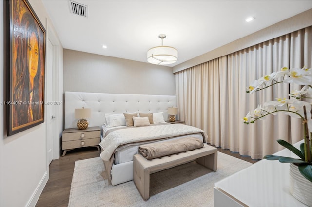 bedroom featuring hardwood / wood-style flooring