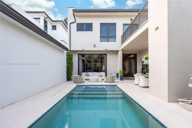 exterior space with a patio area and an outdoor hangout area