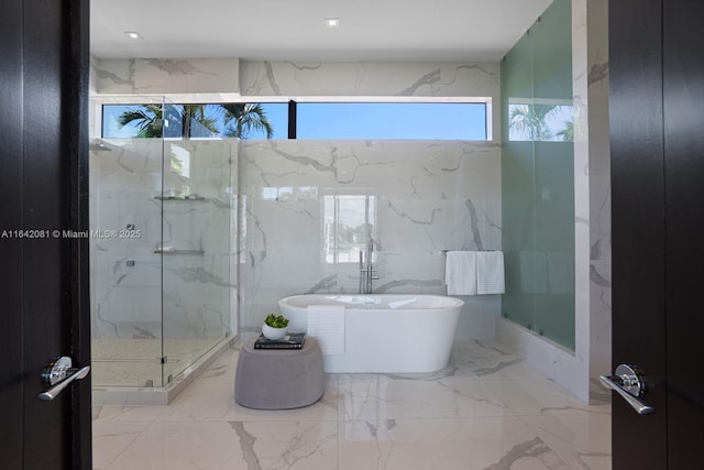 bathroom with independent shower and bath