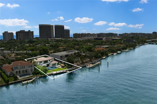 birds eye view of property featuring a water view