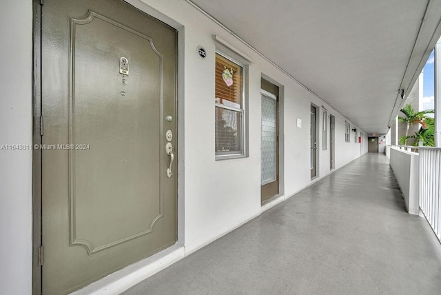 4800 Hillcrest Ln Unit 210, Hollywood, FL 33021 - doorway to property featuring stucco siding
