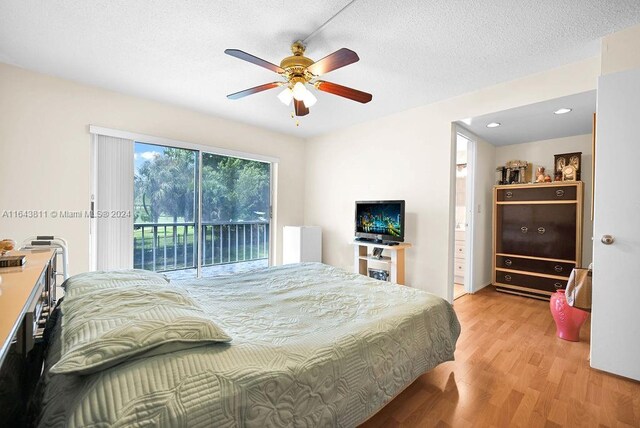 4800 Hillcrest Ln Unit 210, Hollywood, FL 33021 - bedroom with access to exterior, light wood-style floors, ceiling fan, recessed lighting, and a textured ceiling
