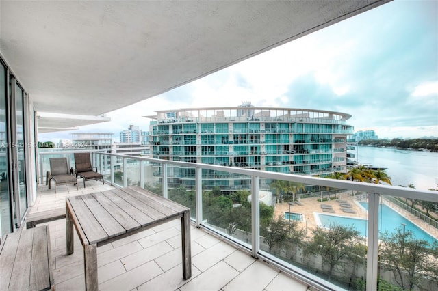 balcony with a community pool