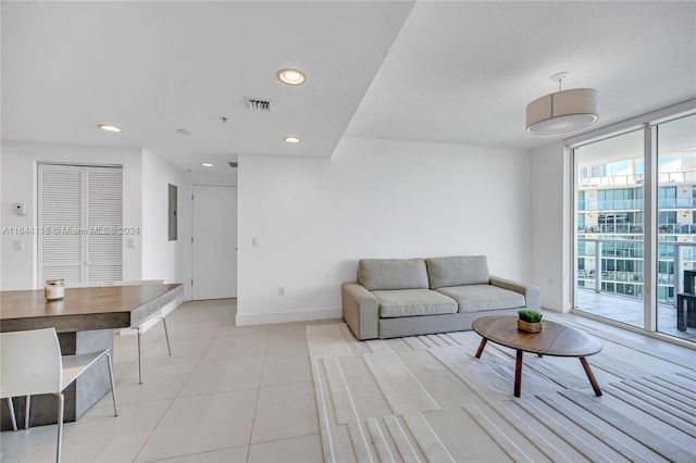 tiled living room with expansive windows