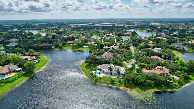 drone / aerial view with a water view