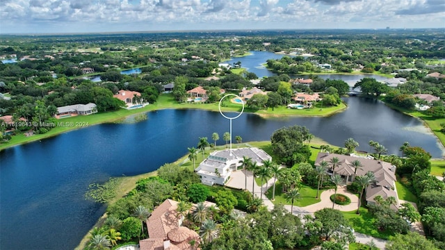 drone / aerial view with a water view