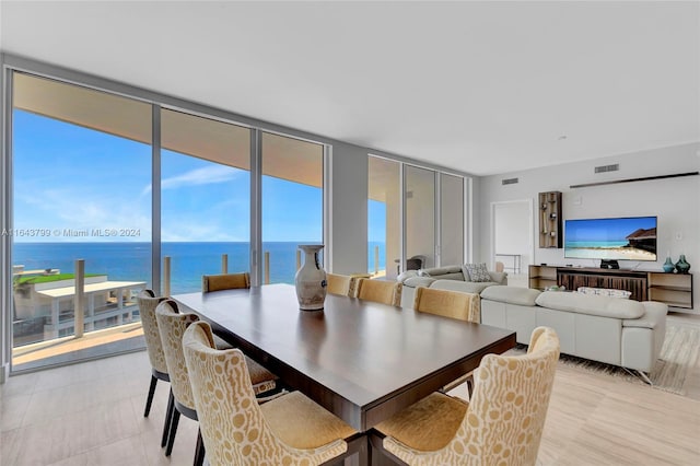 dining room with floor to ceiling windows