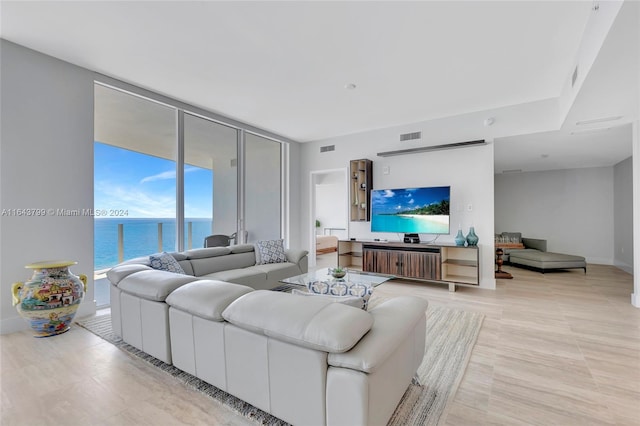 tiled living room with expansive windows