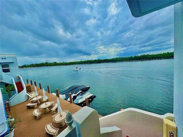 view of dock with a water view