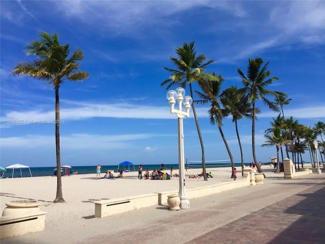 view of water feature with a beach view