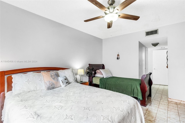 bedroom featuring ceiling fan