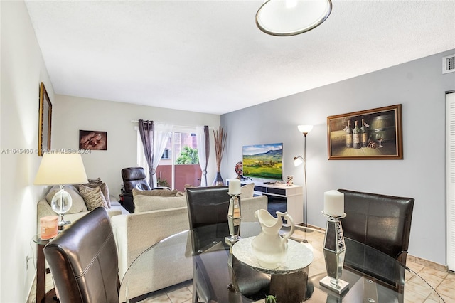 dining room featuring light tile patterned floors