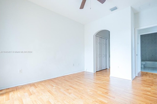 spare room featuring ceiling fan and light wood-type flooring