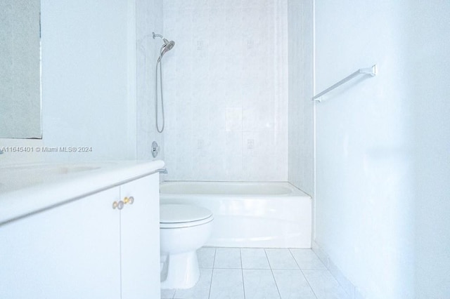 full bathroom featuring tile patterned floors, vanity, bathing tub / shower combination, and toilet