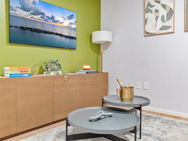 interior space with light wood-style flooring and baseboards