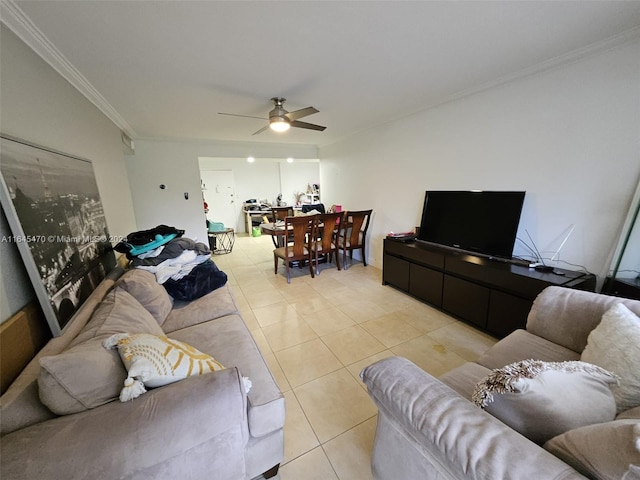 living room featuring light tile patterned flooring, crown molding, and ceiling fan