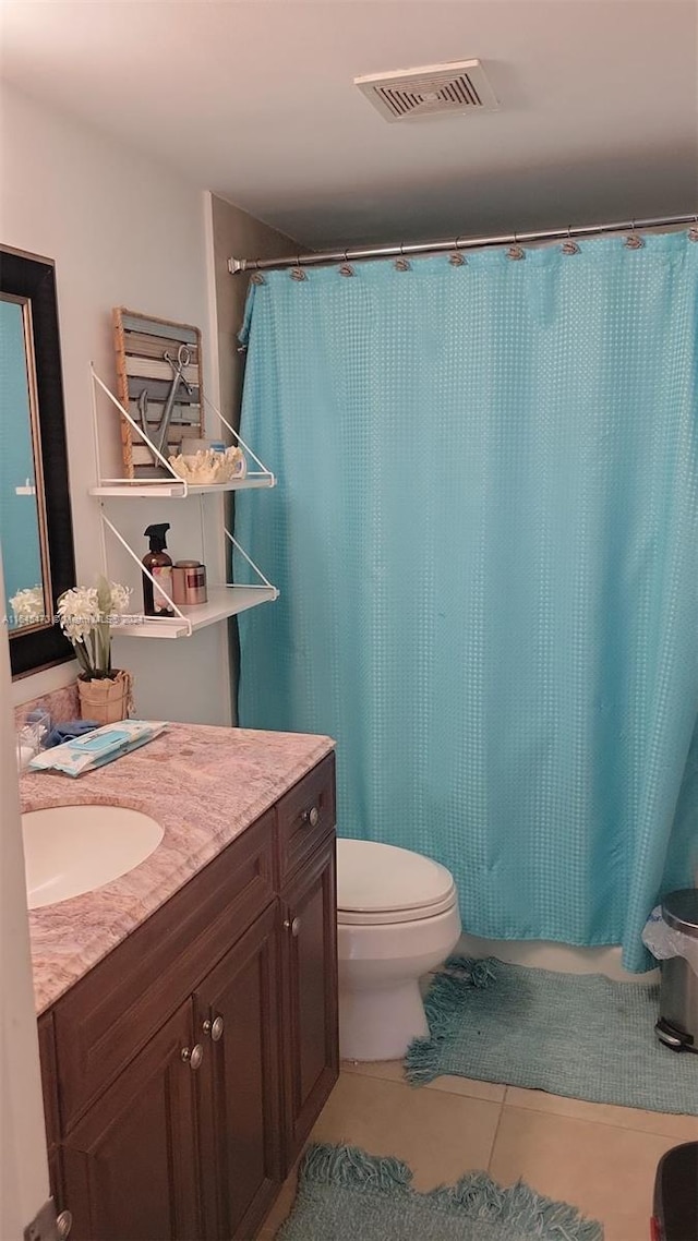 full bath featuring visible vents, toilet, curtained shower, tile patterned flooring, and vanity