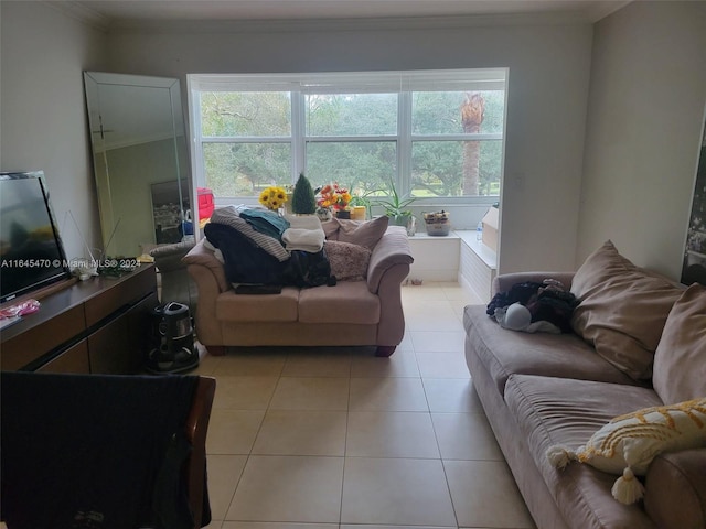 living room featuring light tile patterned floors, plenty of natural light, and crown molding