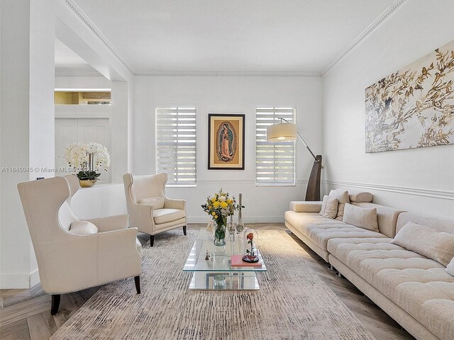 living room with parquet floors and ornamental molding