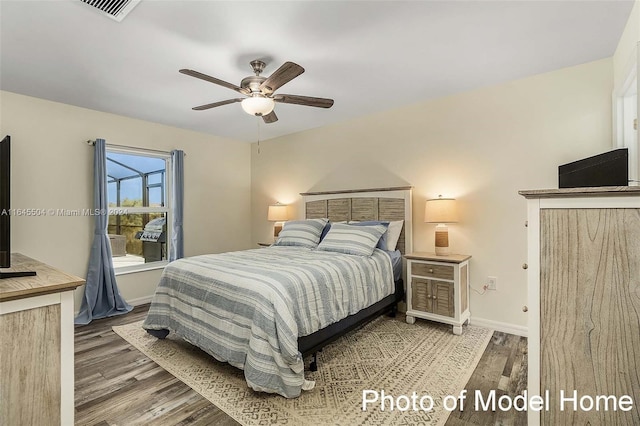 bedroom featuring hardwood / wood-style flooring and ceiling fan