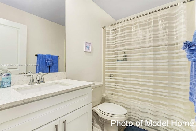 full bathroom featuring shower / bath combination with curtain, toilet, and vanity