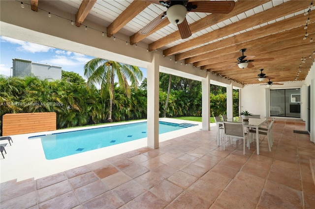 pool featuring a ceiling fan, outdoor dining space, and a patio area