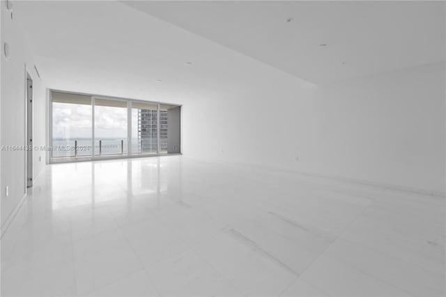 300 Biscayne Blvd Way Unit 4204, Miami, FL 33131 - empty room with floor to ceiling windows and tile patterned floors