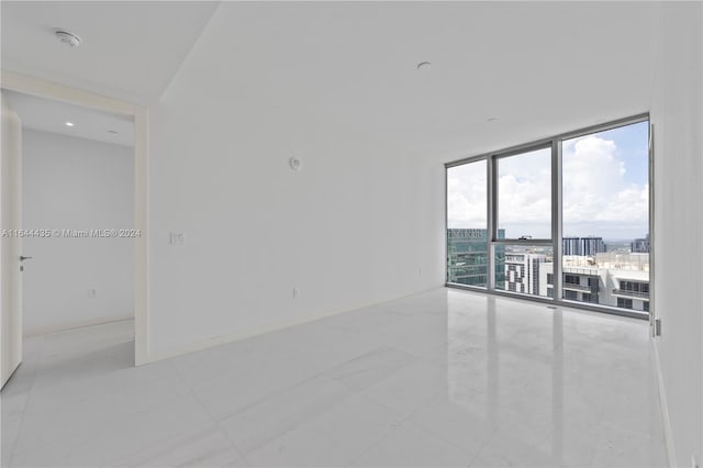 300 Biscayne Blvd Way Unit 4204, Miami, FL 33131 - empty room featuring floor to ceiling windows and a smoke detector