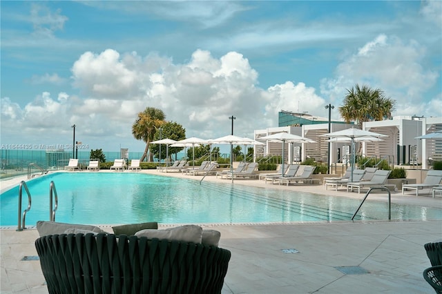 view of pool featuring a patio