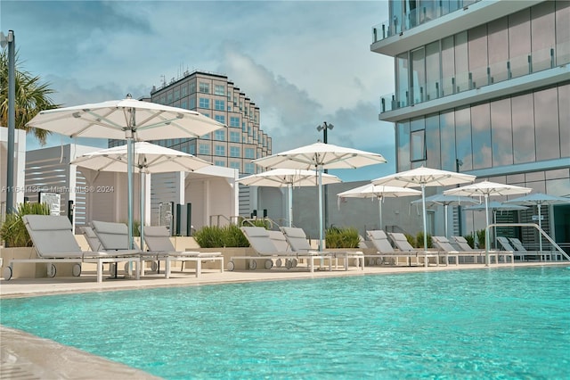 view of swimming pool featuring a patio area