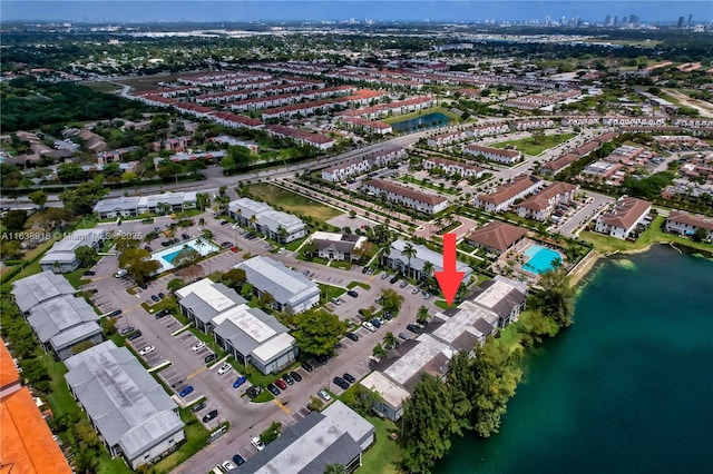 468 NE 206th Ln Unit 105, Miami, FL 33179 - birds eye view of property featuring a water view