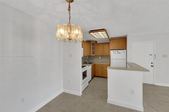 468 NE 206th Ln Unit 105, Miami, FL 33179 - kitchen featuring light countertops, white appliances, an inviting chandelier, a sink, and glass insert cabinets