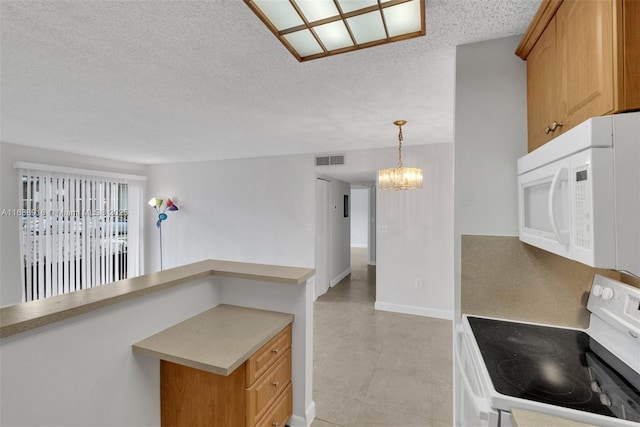 468 NE 206th Ln Unit 105, Miami, FL 33179 - kitchen with light countertops, white appliances, a textured ceiling, visible vents, and a notable chandelier