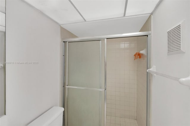 468 NE 206th Ln Unit 105, Miami, FL 33179 - bathroom featuring a shower stall and toilet