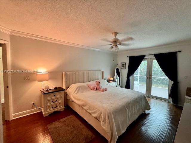 bedroom with ceiling fan, dark wood-type flooring, crown molding, a textured ceiling, and access to outside